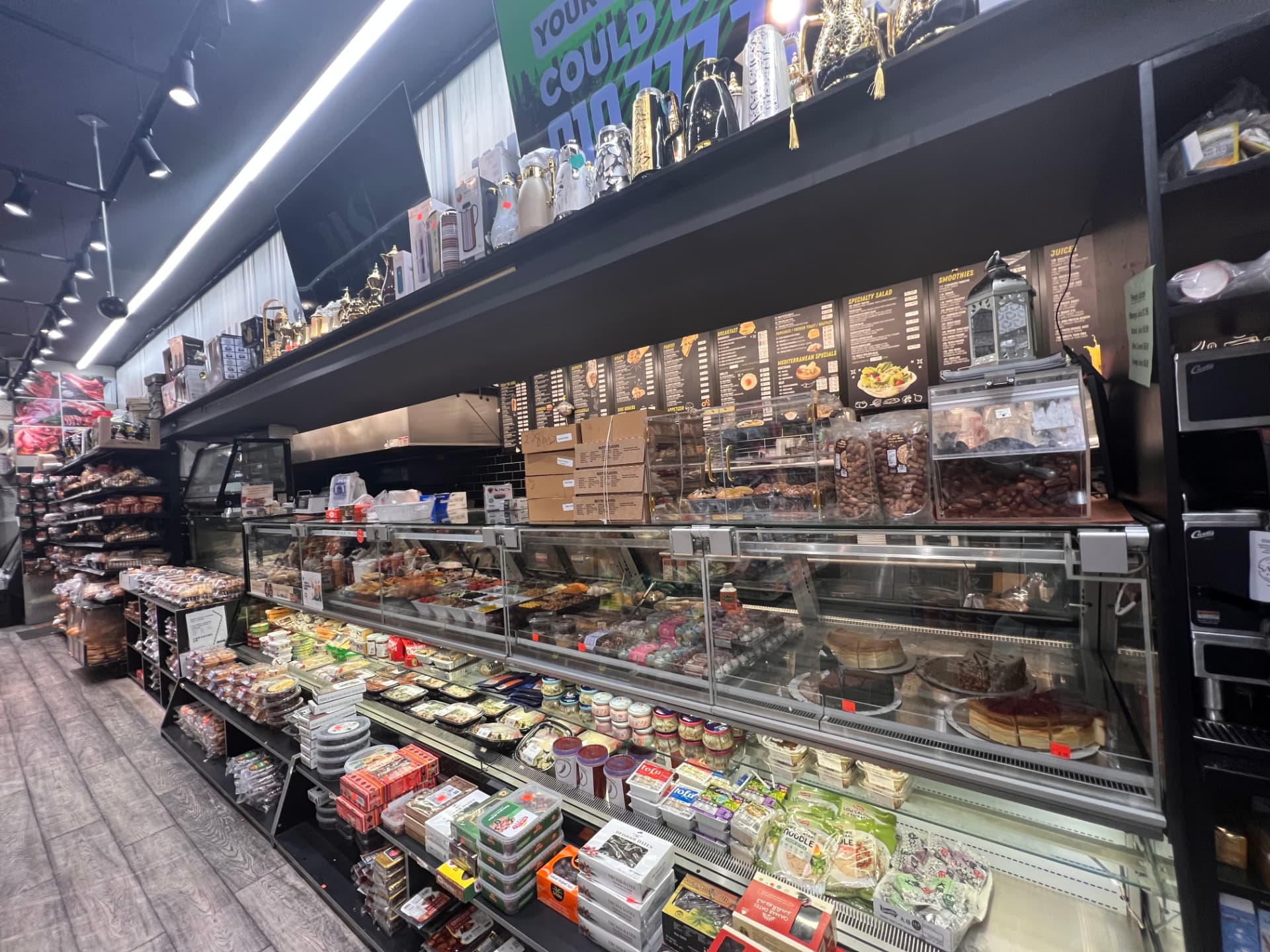 Deli counter and prepared food case at Hana Market