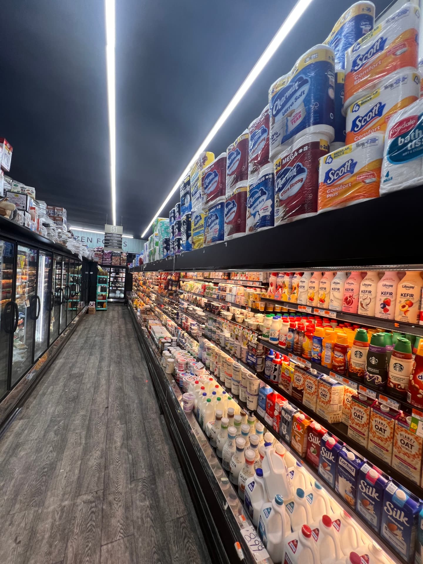 Dairy, milk and household essentials aisle